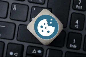 a cyber cookie on a computer keyboard background